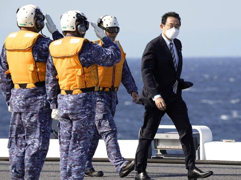 Japan needs to build up its defence capabilities as tensions rise in the region, says Fumio Kishida. (AP PHOTO)