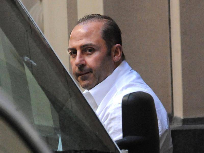 Two men have pleaded guilty over the prison stabbing of Tony Mokbel.