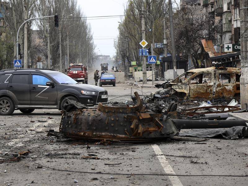Russia says it will stop firing to allow trapped Ukrainians to leave Mariupol.