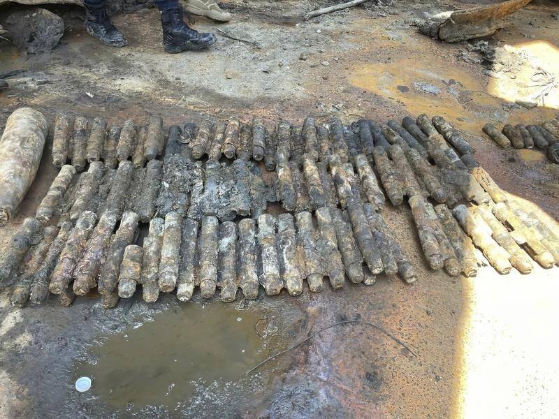 Malaysian authorities say 100 artillery shells, likely from WWII shipwrecks, were found on a barge. (AP PHOTO)