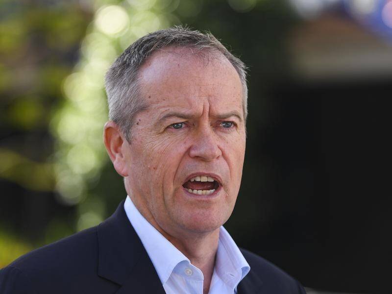 Bill Shorten promises an all-out push to restore penalty rates and lift wages if Labor wins office.