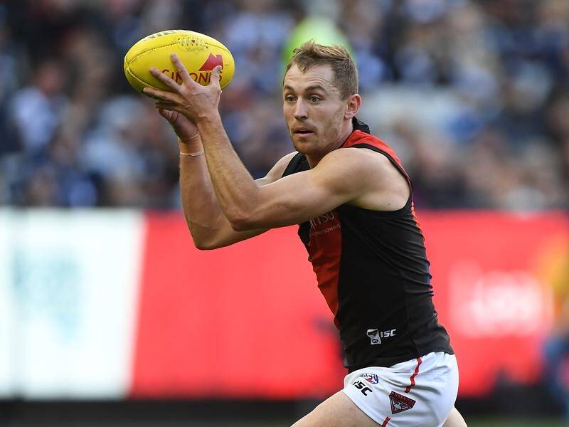 Devon Smith is in doubt to play for Essendon this weekend because of concerns about his knee.