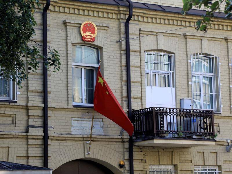 China downgrades its diplomatic presence in Lithuania in response to its increasing ties to Taiwan.