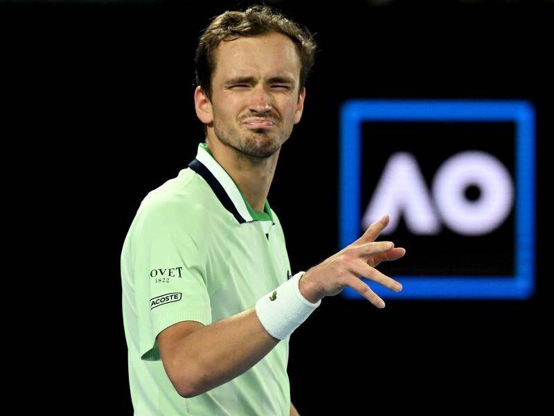 Daniil Medvedev reacts after beating Nick Kyrgios - and a partisan crowd - at Melbourne Park.
