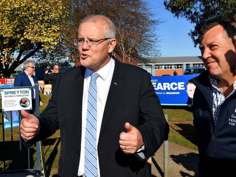 Scott Morrison spent election morning campaigning in Tasmania, then returned to Sydney to vote.