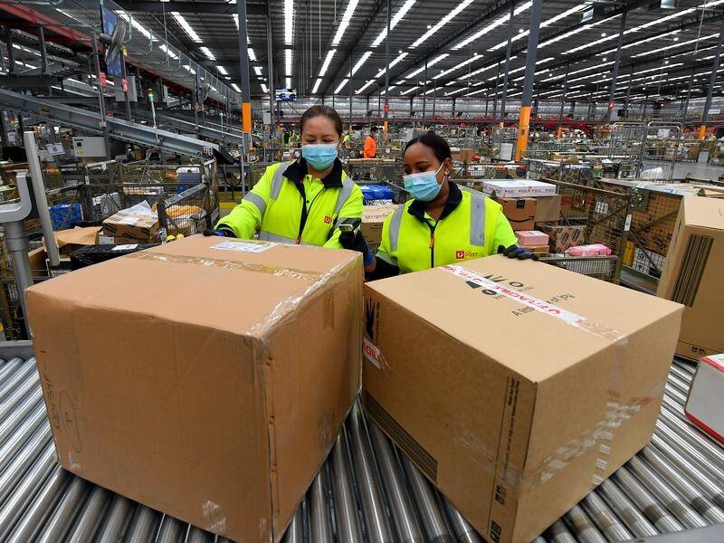 Shoppers who nabbed a Black Friday bargain have helped drive Australia to a delivery parcel record. (James Ross/AAP PHOTOS)