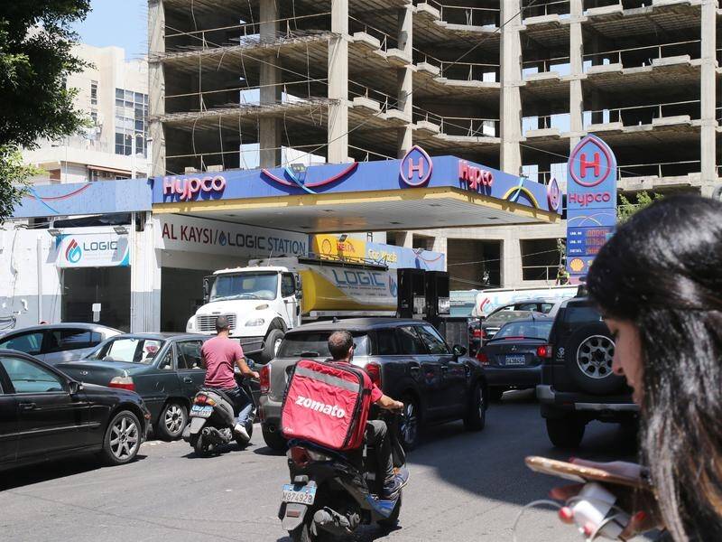 Lebanon's caretaker PM has summoned the central bank governor over a decision to end fuel subsidies.