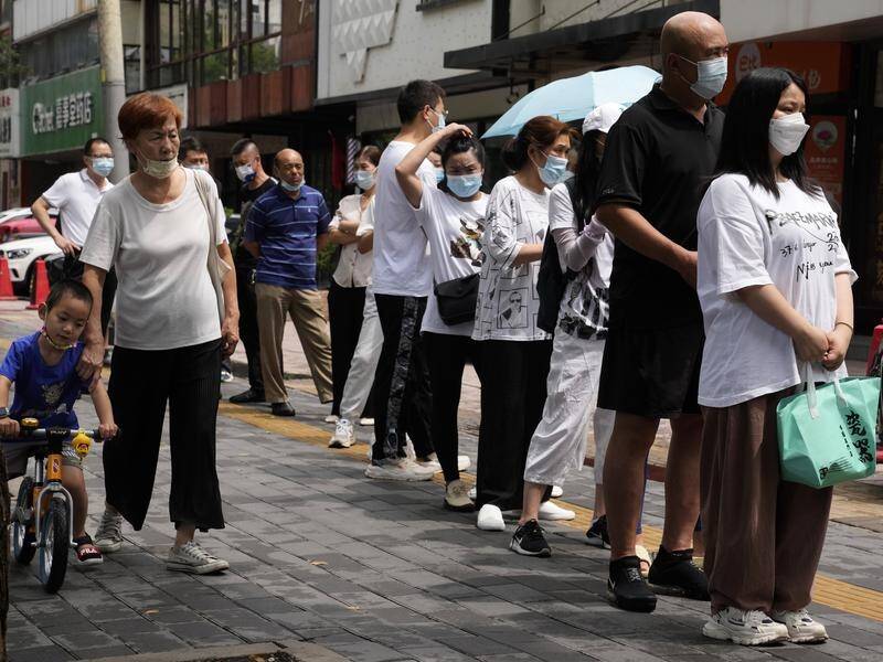 Residents line up for coronavirus testing in Beijing.