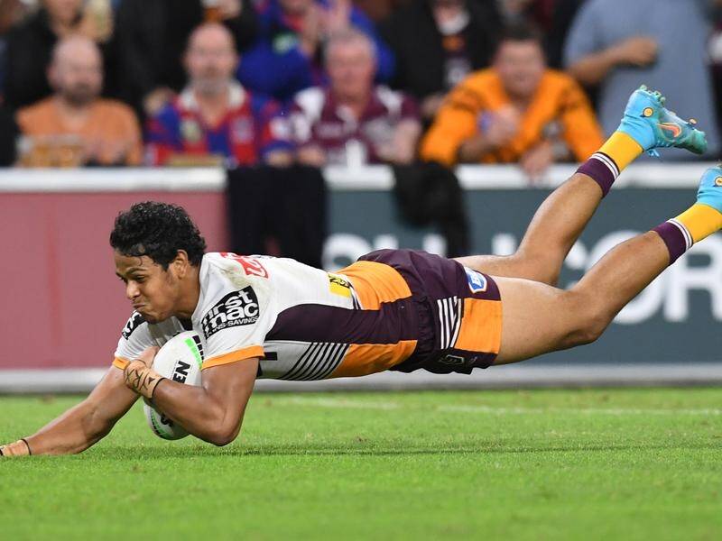 Broncos' teen star Selwyn Cobbo piling over for one of his three tries against Manly.