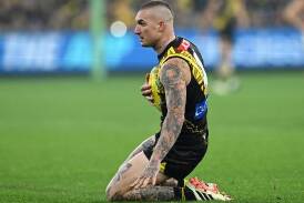 Dustin Martin put on a familiar vintage show only for Richmond to fall just short against Essendon. (Joel Carrett/AAP PHOTOS)