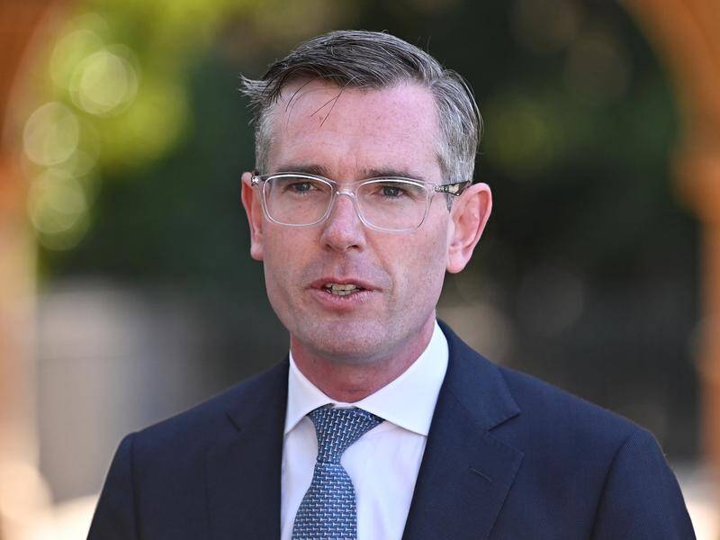 NSW Premier Dominic Perrottet wants the isolation period for COVID-19 cases reconsidered. (Steven Saphore/AAP PHOTOS)