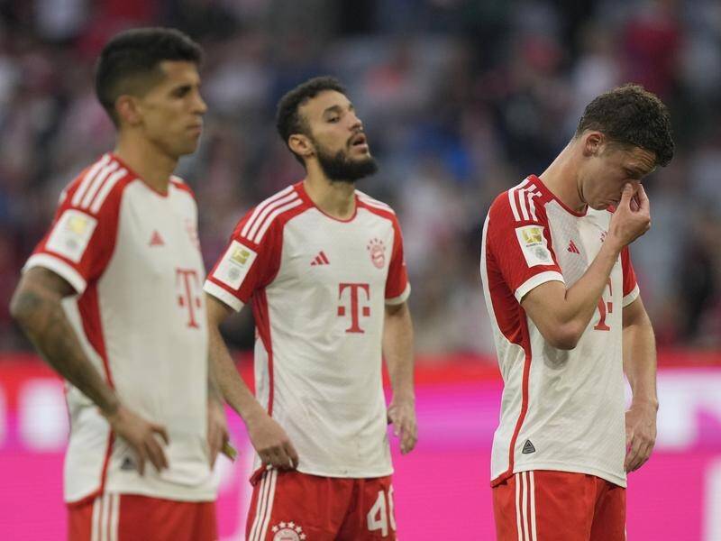 Bayern Munich players look shell-shocked after their defeat to Leipzig may have cost them the title. (AP PHOTO)