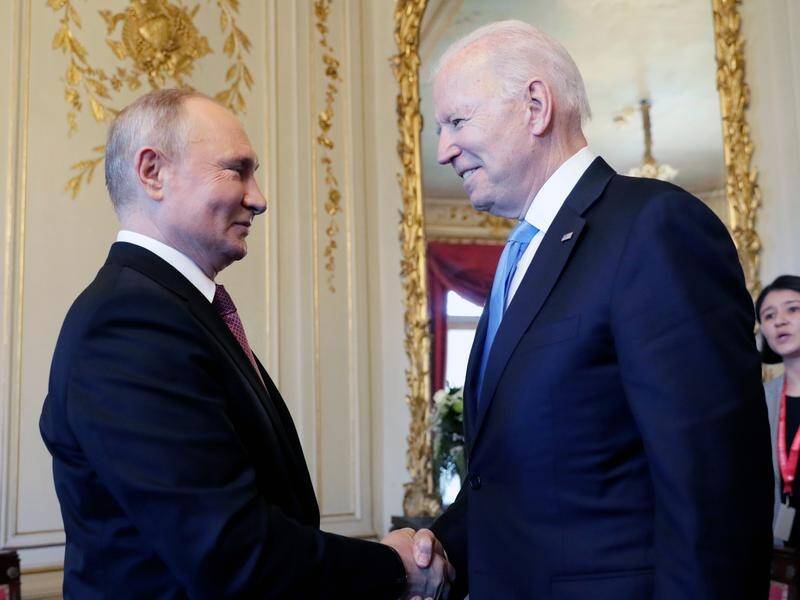 France says Vladimir Putin (left) and Joe Biden have agreed to hold talks on Ukraine.
