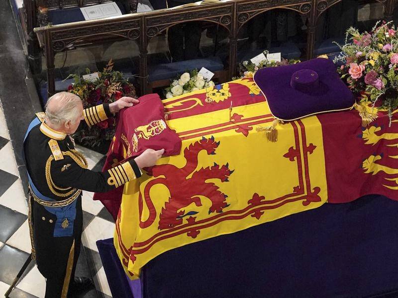 Queen Elizabeth has been laid to rest beside her late husband, Prince Philip. (AP PHOTO)