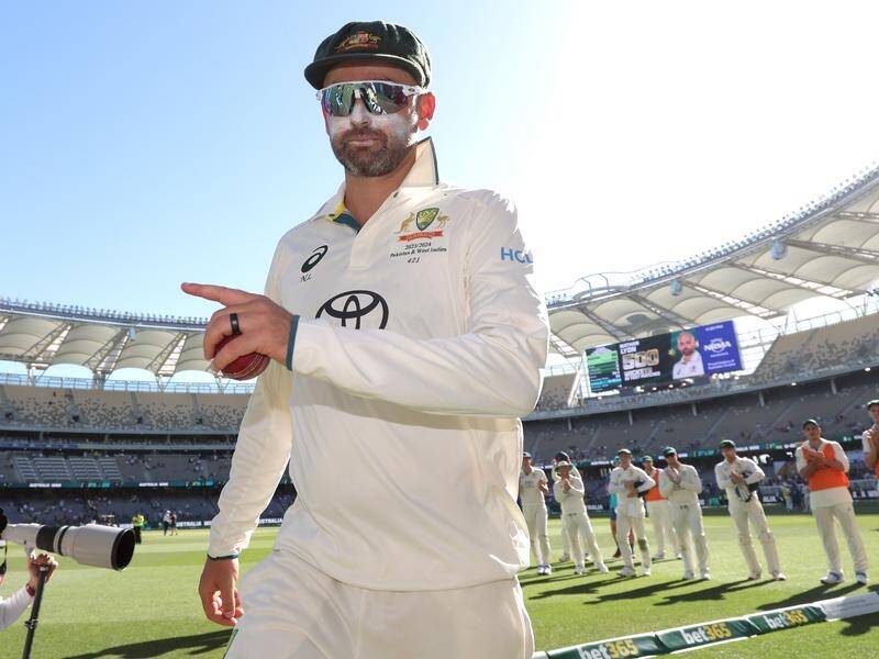 Nathan Lyon has become just the third Australian in Test cricket history to take 500 wickets. Picture AAP