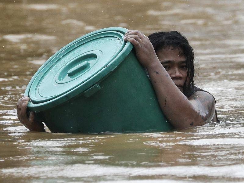Vamco has submerged low-lying suburbs in Manila and left millions without power.