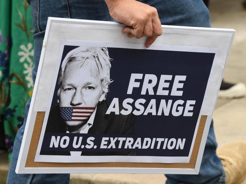 Supporters of Julian Assange will rally outside Parliament House in Canberra on Thursday. (Peter Rae/AAP PHOTOS)