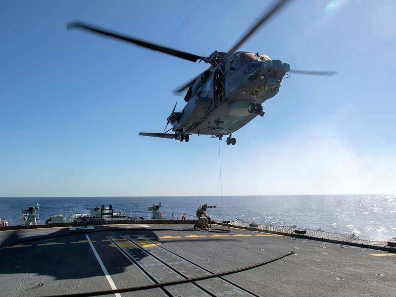 The HMCS Fredericton lost contact with a CH-148 Cyclone helicopter during a NATO training exercise.