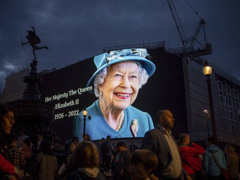 Billboards around London are displaying tributes to the Queen, who has died aged 96. (EPA PHOTO)