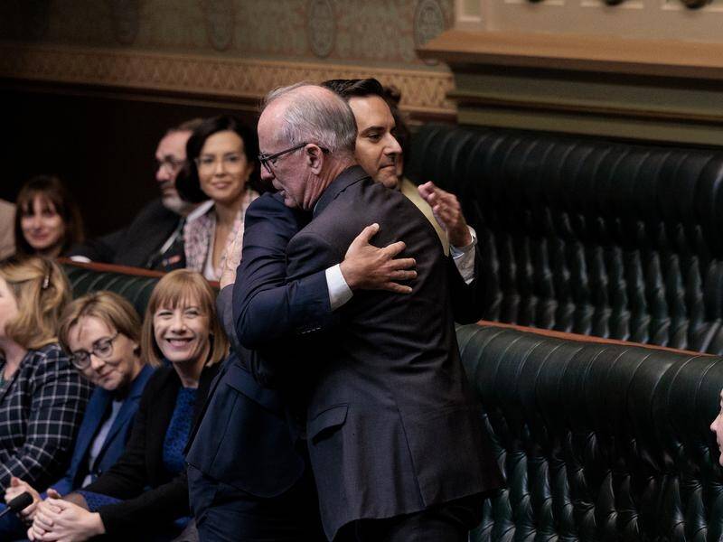 NSW MP Alex Greenwich (L, standing) has been credited for the respectful handling of VAD laws.