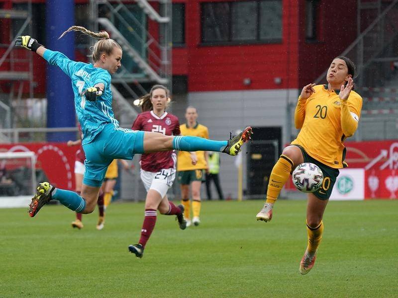 Australia's Sam Kerr challenges Germany's flying goalie Merle Frohms in the Matildas' hammering.