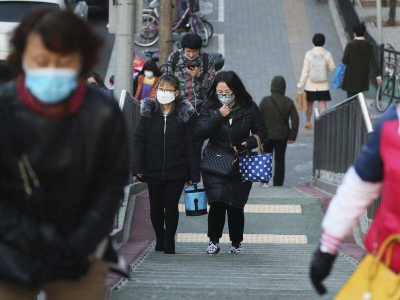 Mainland China has reported a drop in the number of new coronavirus cases.