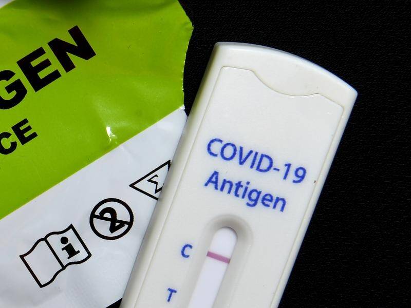 NSW and Victoria no longer require people to report positive COVID-19 test results. (Darren England/AAP PHOTOS)