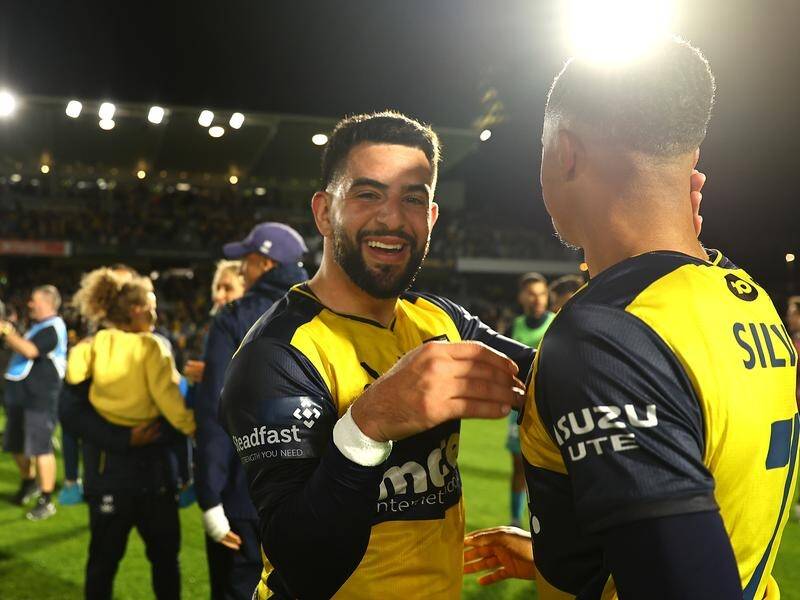 Christian Theoharous is all smiles after the Mariners booked their A-League Men finals place. (Jeremy Ng/AAP PHOTOS)