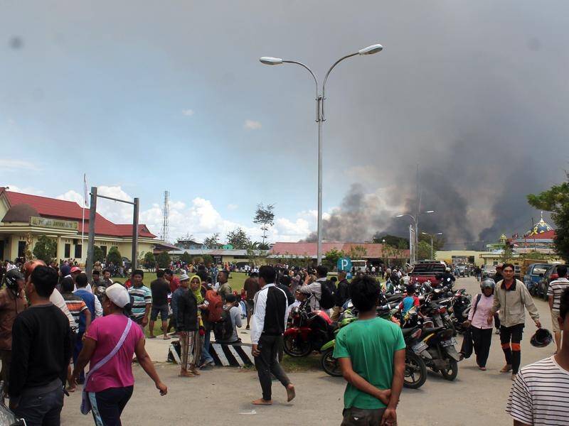 Officials say the death toll has risen to 27 in unrest in Indonesia's Papua province.