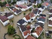 Parts of southern Germany have been inundated and residents evacuated following severe storms. (AP PHOTO)