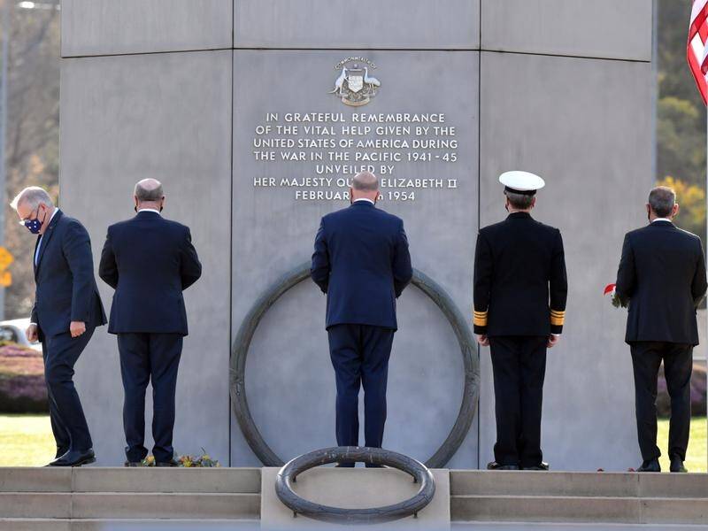 Scott Morrison (left) lays a wreath in Canberra to mark the 70th anniversary of the ANZUS treaty.
