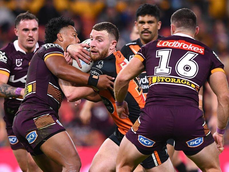 Jackson Hastings (c) looks likely to start at lock rather than halfback for Wests Tigers. (Jono Searle/AAP PHOTOS)