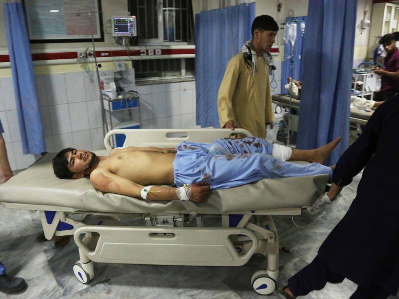 More than 60 people have been killed in a suicide-bomb blast at a wedding in Kabul.