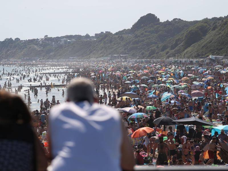 Medical groups have warned of a second cornavirus wave in the UK as people flocked to the beach.