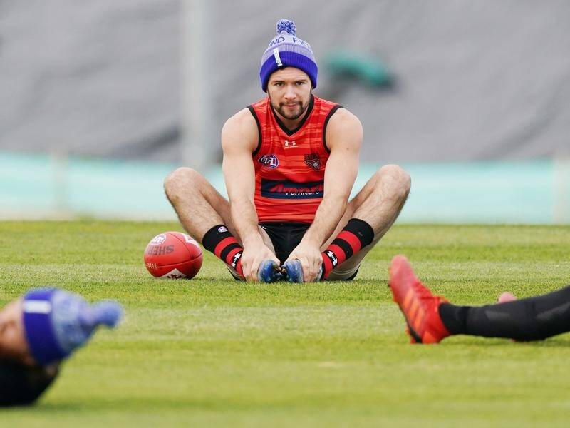 Conor McKenna failed a COVID-19 test, forcing the AFL to postpone Essendon's game with the Demons.