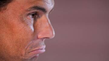 Rafael Nadal, speaking at the Madrid Open, is not sure he'll be fit to play the French Open. (AP PHOTO)