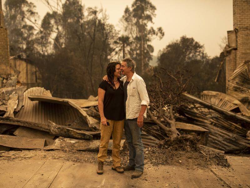Charities are getting $40m to hand out to people who've lost homes and livelihoods in the fires.
