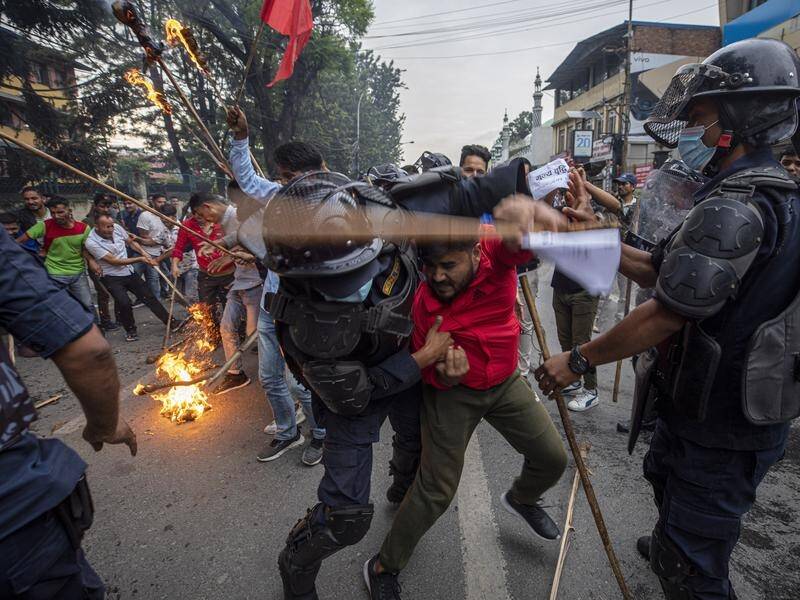 Nepali protesters have scuffled with police during a demo against rises in petrol and diesel prices.