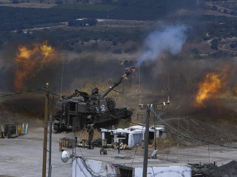 Israel's military says its forces have fired artillery into Lebanon in response to a rocket attack.