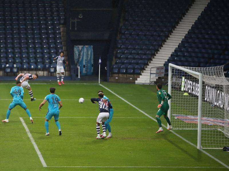 Dara O'Shea's header sealed a West Brom win over Derby, sending them top of the Championship.