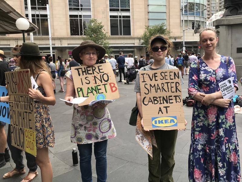 Protesters in Sydney demand governments take real action to reduce carbon emissions.