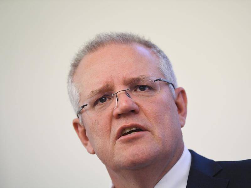 Scott Morrison is urging the world's two largest economies to resolve their differences.