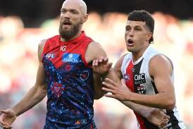 Melbourne's Max Gawn (left) overcame an injury scare to outpoint St Kilda's Rowan Marshall. (James Ross/AAP PHOTOS)