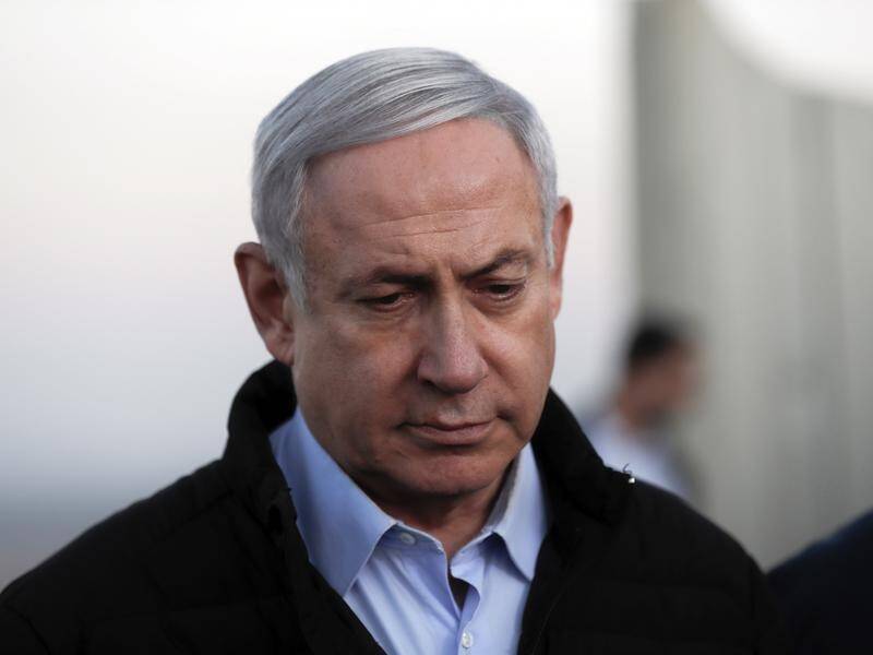 Israel's PM Benjamin Netanyahu will not have to resign as he fights corruption charges.