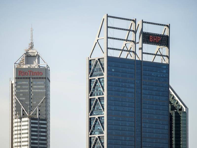 Rio Tinto and BHP are among energy companies to score well on making climate change commitments. (Aaron Bunch/AAP PHOTOS)
