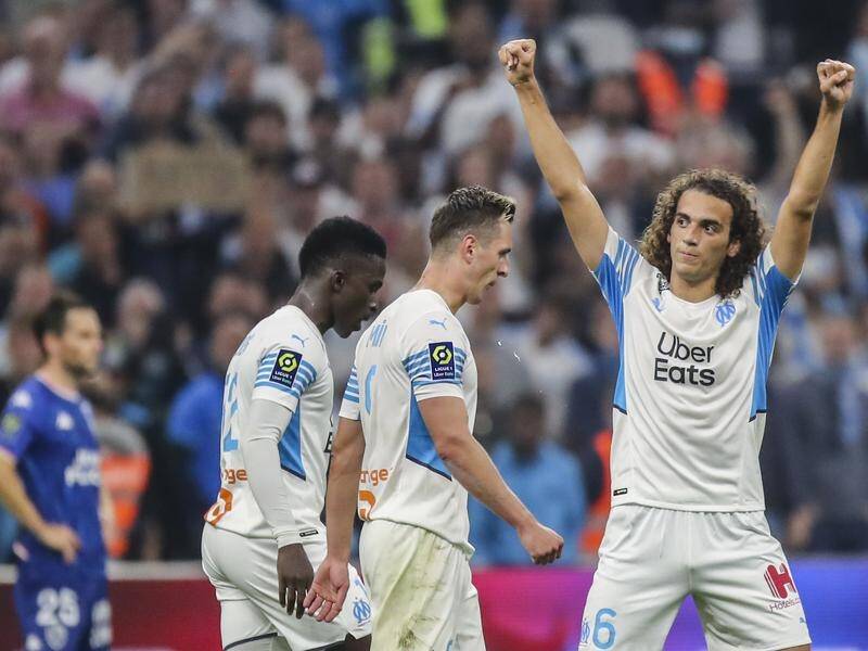 Marseille's Matteo Guendouzi celebrates one of his two goals against Lorient in Ligue 1.