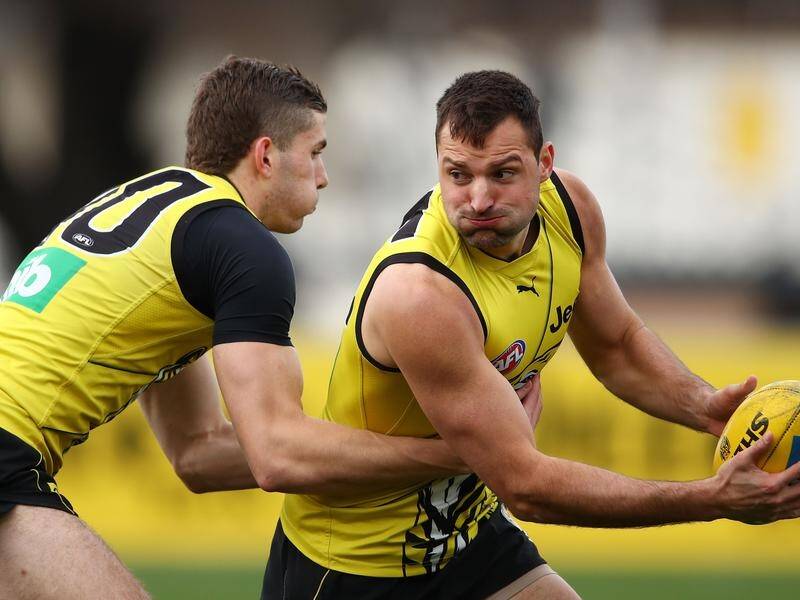 Toby Nankervis (right) makes his return from a long-term groin injury for Richmond against Carlton.
