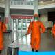 Staff disinfect Pyongyang station in a campaign to curb a COVID-19 outbreak in North Korea.