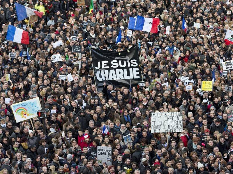 Charlie Hebdo says it would be "cowardice" not to republish images that sparked anger among Muslims.