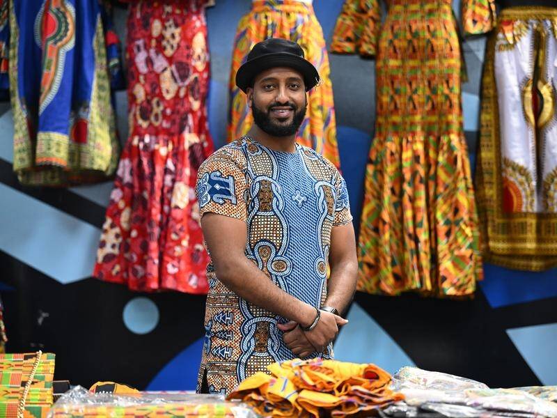 Saleh Siraj is among refugees who have opened stalls at Melbourne's Queen Victoria Market. (JAMES ROSS)